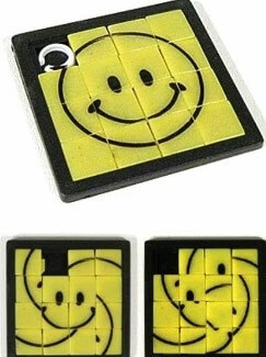 Image of a sliding picture puzzle that shows a happy face puzzle that is completed and two versions of the same puzzle with the pieces out of order