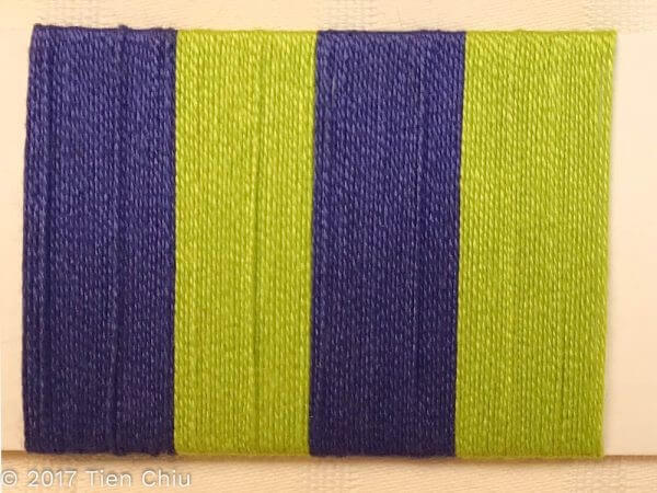 A card wrap showing equal stripes of yellow-green and blue-purple