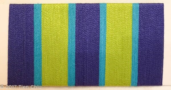 A card wrap with wide stripes of yellow-green and blue-purple, with narrow stripes of turquoise between them