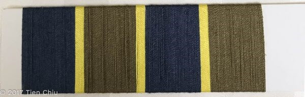 a card wrap showing wide stripes of olive and navy, with narrow stripes of yellow-green between them