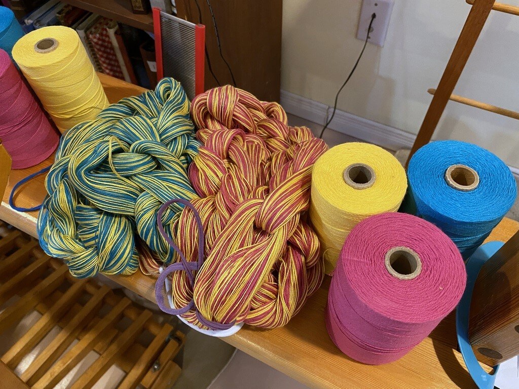 A chained warp of weaving yarn for the loom
